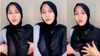 Tante Berjilbab Hitam Dengan Gaul Transparan Menggoda